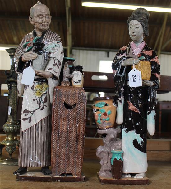 A pair of large Japanese slip-decoration pottery figures, early 20th century, 57cm